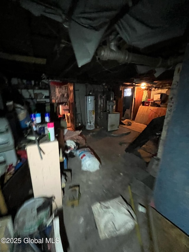 unfinished basement featuring gas water heater