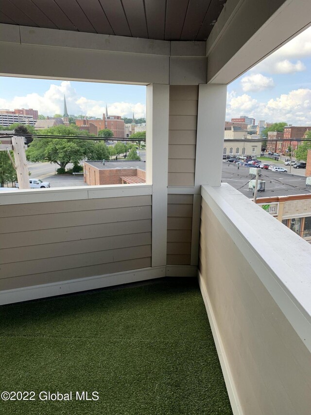 balcony featuring a view of city
