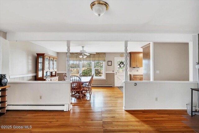 23 Leggett Rd, Ghent, NY 12075 - interior space with wood finished floors, a baseboard heating unit, and ceiling fan