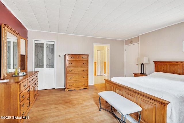 23 Leggett Rd, Ghent, NY 12075 - bedroom featuring connected bathroom, light wood-style floors, and ornamental molding