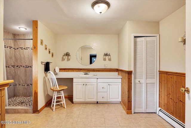 23 Leggett Rd, Ghent, NY 12075 - full bathroom featuring a baseboard radiator, vanity, a closet, and walk in shower