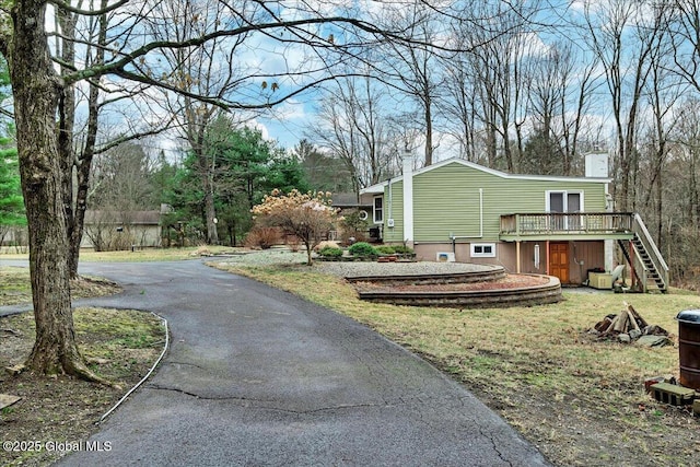 23 Leggett Rd, Ghent, NY 12075 - exterior space with driveway, a wooden deck, and stairway