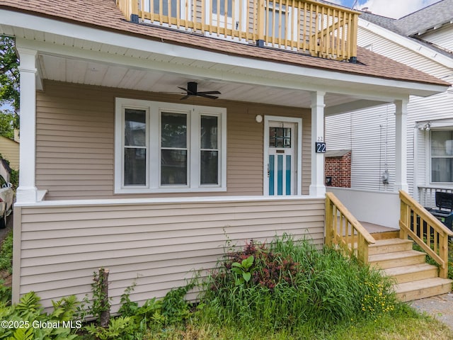 22 Fairlawn Ave, Albany, NY 12203 - view of exterior entry with a balcony, ceiling fan, a porch, and a shingled roof
