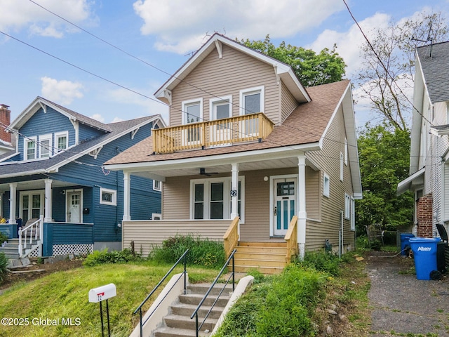 22 Fairlawn Ave, Albany, NY 12203 - view of front of house featuring a porch, a balcony, roof with shingles, and stairway