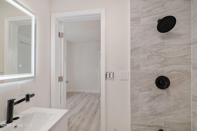 22 Fairlawn Ave, Albany, NY 12203 - full bathroom with tiled shower, a sink, and wood finished floors