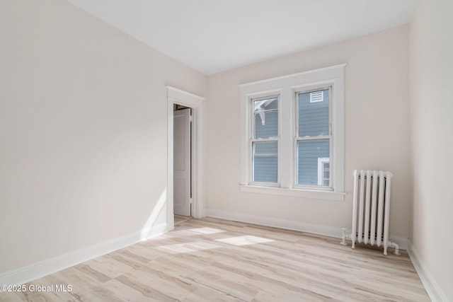 22 Fairlawn Ave, Albany, NY 12203 - spare room with radiator, light wood finished floors, and baseboards