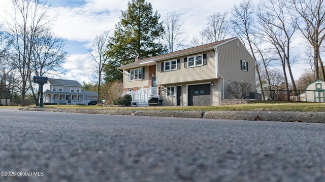 7 Bemis Heights Rd, Saratoga Springs, NY 12866 - split foyer home with a garage