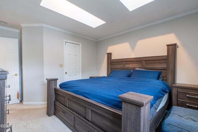 7 Bemis Heights Rd, Saratoga Springs, NY 12866 - bedroom with baseboards, light colored carpet, ornamental molding, and a skylight