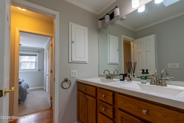 7 Bemis Heights Rd, Saratoga Springs, NY 12866 - full bathroom with crown molding, double vanity, a sink, and baseboards