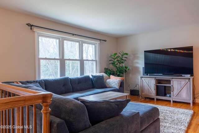 7 Bemis Heights Rd, Saratoga Springs, NY 12866 - living area featuring baseboards and wood finished floors