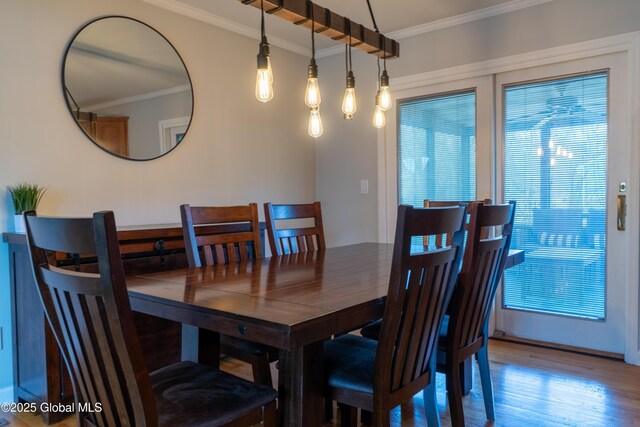 7 Bemis Heights Rd, Saratoga Springs, NY 12866 - dining area featuring crown molding and wood finished floors
