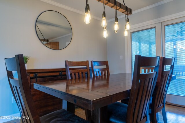 7 Bemis Heights Rd, Saratoga Springs, NY 12866 - dining area featuring wood finished floors and ornamental molding