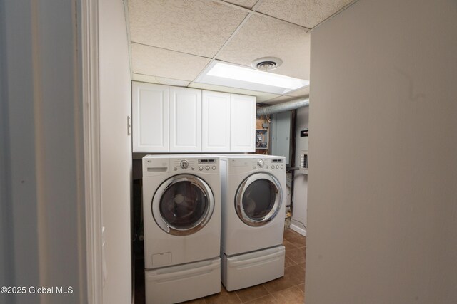 7 Bemis Heights Rd, Saratoga Springs, NY 12866 - laundry area with tile patterned floors, separate washer and dryer, visible vents, and cabinet space