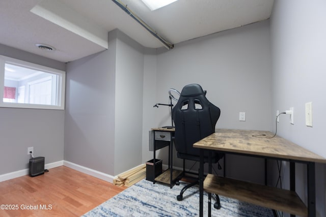 7 Bemis Heights Rd, Saratoga Springs, NY 12866 - home office featuring light wood-style floors, visible vents, and baseboards