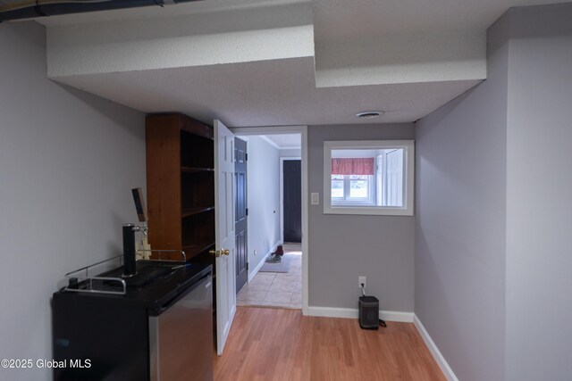 7 Bemis Heights Rd, Saratoga Springs, NY 12866 - hallway with visible vents, baseboards, and light wood-type flooring
