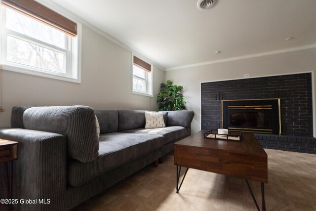 7 Bemis Heights Rd, Saratoga Springs, NY 12866 - living room with carpet flooring, a brick fireplace, visible vents, and crown molding