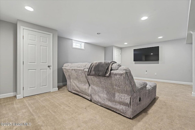 living room with recessed lighting, baseboards, and carpet floors