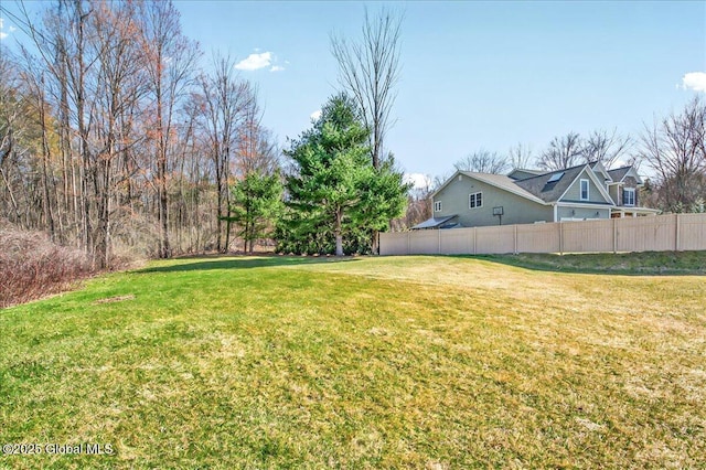 view of yard with fence