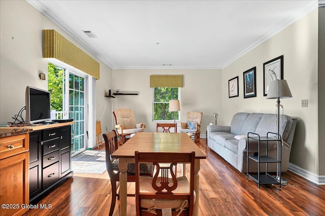 8 Wall St Apt 200, Clifton Park, NY 12065 - dining space with dark wood-type flooring, crown molding, and baseboards