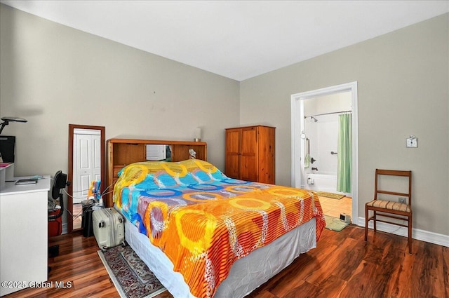8 Wall St Apt 200, Clifton Park, NY 12065 - bedroom featuring wood finished floors, a desk, connected bathroom, and baseboards