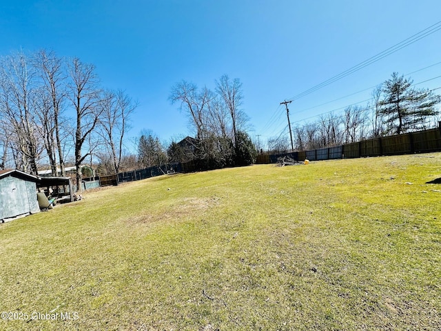 view of yard featuring fence
