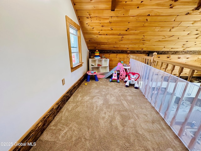recreation room with wooden walls, carpet, baseboards, vaulted ceiling, and wood ceiling