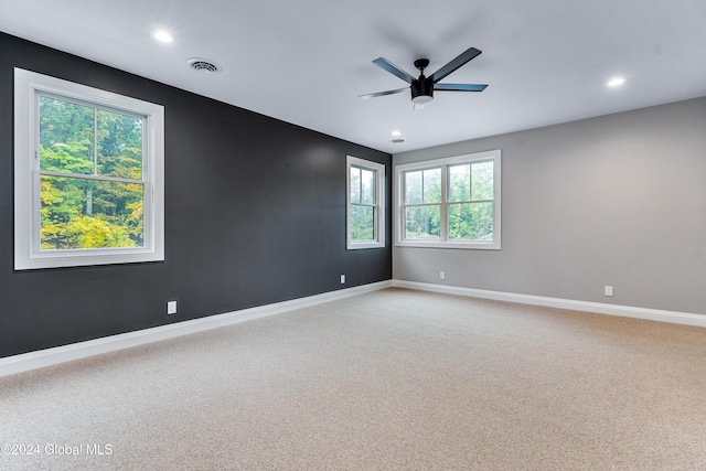 spare room featuring carpet, baseboards, visible vents, ceiling fan, and recessed lighting