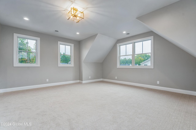 bonus room featuring light carpet, baseboards, vaulted ceiling, and recessed lighting