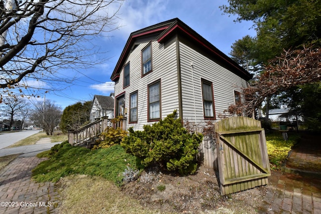 21 Andrews St, Saratoga Springs, NY 12866 - view of property exterior featuring a gate