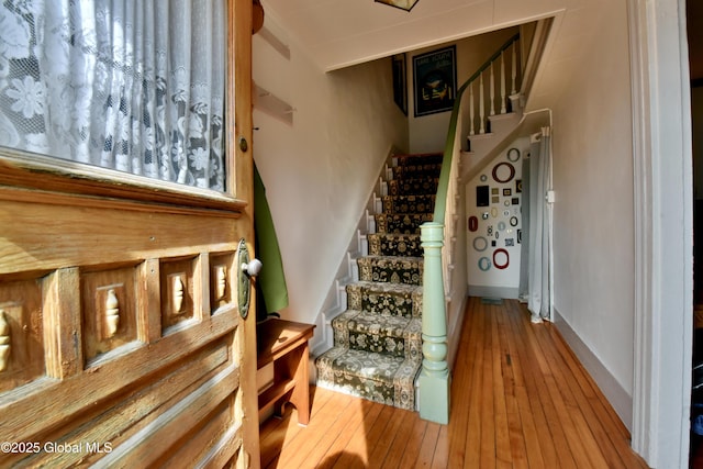 21 Andrews St, Saratoga Springs, NY 12866 - staircase with baseboards and hardwood / wood-style floors