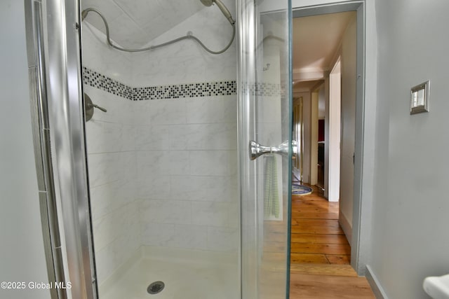 21 Andrews St, Saratoga Springs, NY 12866 - full bath with a stall shower, baseboards, and wood finished floors
