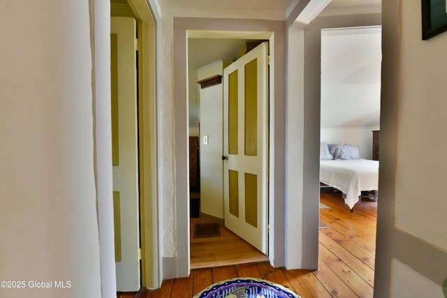 21 Andrews St, Saratoga Springs, NY 12866 - corridor with visible vents and hardwood / wood-style flooring