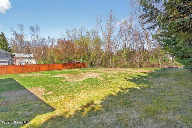 view of yard featuring fence
