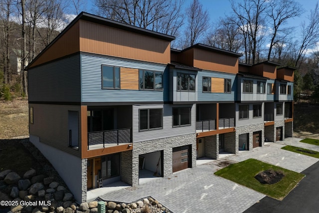 exterior space with a garage and driveway