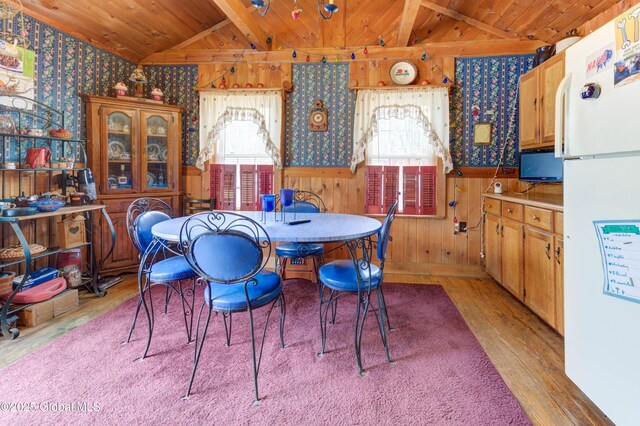 3183 State Highway 10, Ephratah, NY 12095 - dining area with a wainscoted wall, wallpapered walls, light wood-type flooring, vaulted ceiling, and wood ceiling