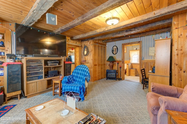 3183 State Highway 10, Ephratah, NY 12095 - living room featuring wood walls, a wood stove, carpet flooring, wooden ceiling, and beamed ceiling