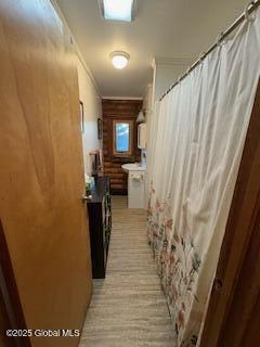 hallway with ornamental molding