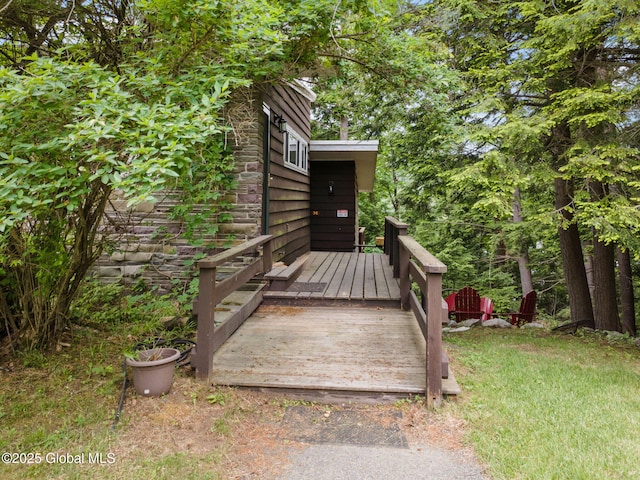 5 Overlook Ln B/D, Unit B/D Warrensburg, NY 12817 - doorway to property featuring stone siding and a lawn