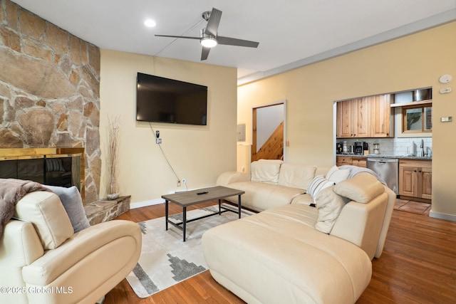 5 Overlook Ln B/D, Unit B/D Warrensburg, NY 12817 - living room with a ceiling fan, wood finished floors, and a stone fireplace