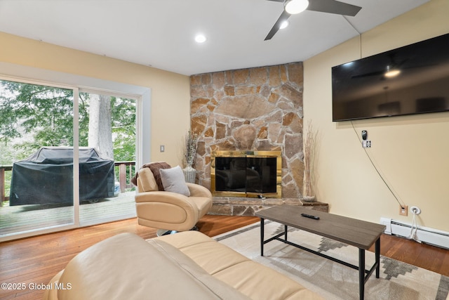 5 Overlook Ln B/D, Unit B/D Warrensburg, NY 12817 - living room with wood finished floors, a fireplace, ceiling fan, a baseboard heating unit, and recessed lighting