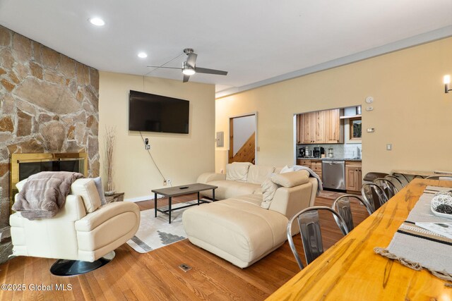 5 Overlook Ln B/D, Unit B/D Warrensburg, NY 12817 - living area featuring wood finished floors, a ceiling fan, recessed lighting, and a fireplace