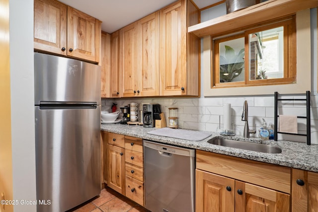 5 Overlook Ln B/D, Unit B/D Warrensburg, NY 12817 - kitchen with stainless steel appliances, light tile patterned flooring, backsplash, and light stone counters