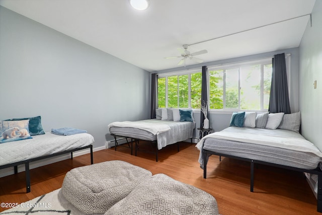 5 Overlook Ln B/D, Unit B/D Warrensburg, NY 12817 - bedroom with wood finished floors and ceiling fan