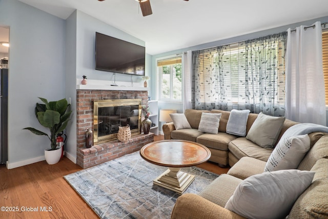 5 Overlook Ln B/D, Unit B/D Warrensburg, NY 12817 - living area featuring vaulted ceiling, a ceiling fan, wood finished floors, and a fireplace