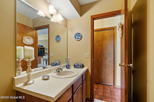 bathroom featuring tile patterned floors and vanity