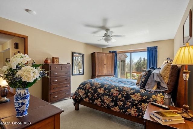 bedroom with access to outside, light carpet, and ceiling fan