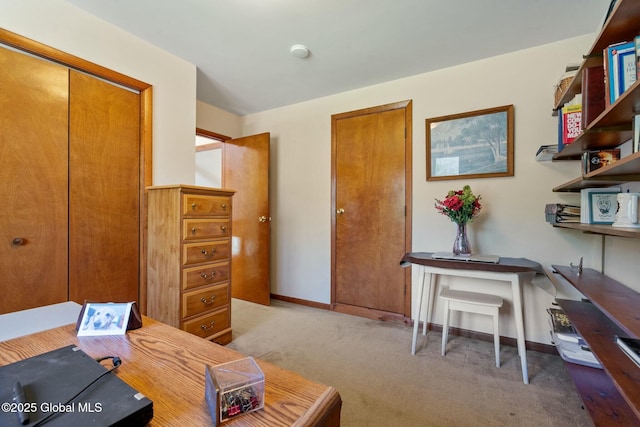 office area with baseboards and light colored carpet
