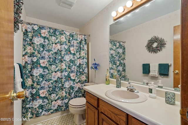 bathroom featuring vanity, visible vents, toilet, tile patterned floors, and a shower with curtain