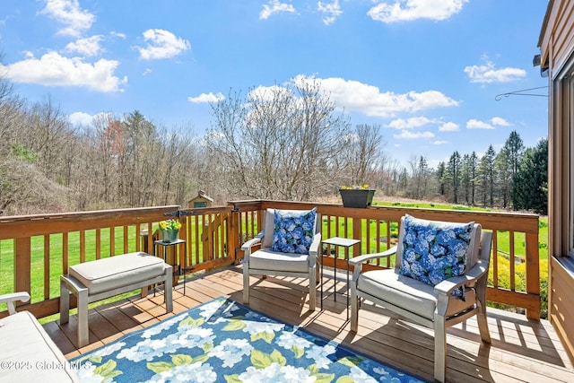 wooden terrace with a yard