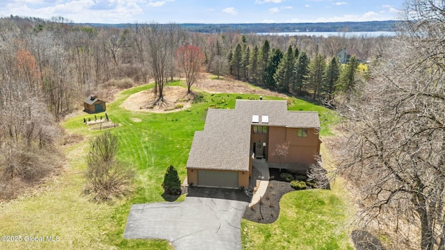 drone / aerial view with a forest view